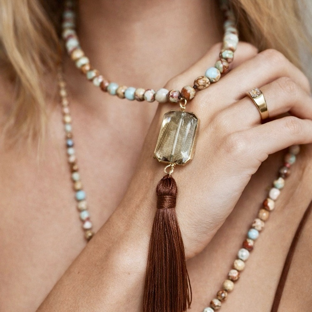 Elegant Beaded Necklace with Gold Accents